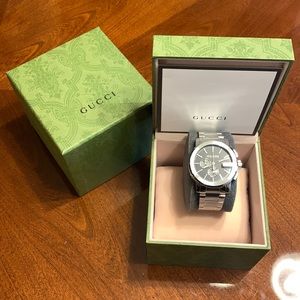 Brand new, NEVER worn authentic men’s Gucci watch